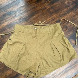 Free people tie side short olive in color. Size small